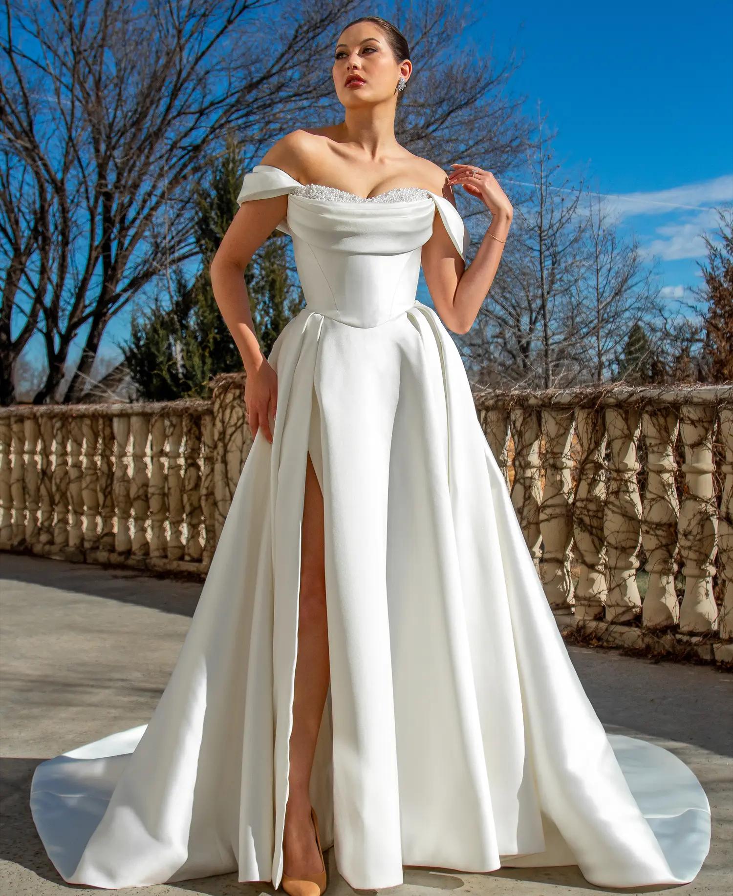 Photo of Model wearing a Blush Bridal Salon Bridal Collection Gown