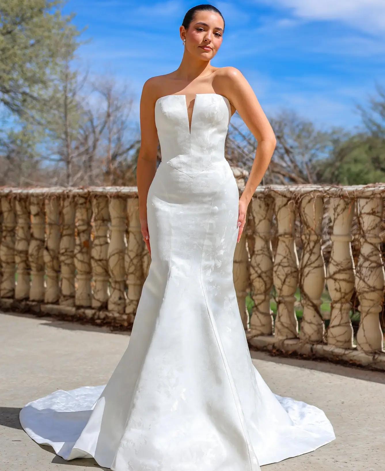 Photo of Model wearing a Blush Bridal Salon Bridal Collection Gown